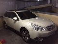 2010 Subaru Outback AT White SUV For Sale -0