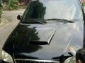 kia grand carnival 2002 blackvan for sale -3