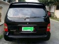 kia grand carnival 2002 blackvan for sale -8