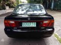 Mazda 323 Familia 1996  Black For Sale -4