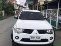 2009 Mitsubishi Strada White Pickup For Sale -0