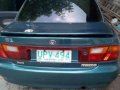 mazda 323 1997 Green sedan for sale -1