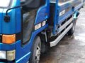 Isuzu Elf nkr 14ft dropside 2000 FOR SALE-0