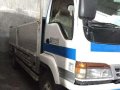 2004 Isuzu Forward Dropside 6HE1 For Sale -1