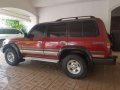 SELLING red 1997 Toyota Land Cruiser 80-0