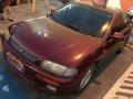 SELLING Mazda 323 1996-4