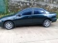 Mazda 323 1999 Model Green For Sale -1