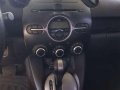 Mazda 2 2010 15 AT White Sedan for sale-3