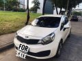 Rush KIA RIO 2013 MT Pearl White Sedan-1