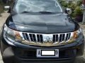 Assume 2015 Mitsubishi Strada 4x2 Manual -0