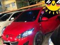 For sale Mazda 2 red hatch back Model 2011-0