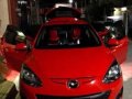 For sale Mazda 2 red hatch back Model 2011-3