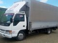 2007 Isuzu Elf Canvass Wingvan 4hj1 16.5ft with Power Lifter For Sale-1