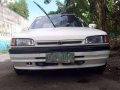 Mazda 323 Familia 97 model MT-7