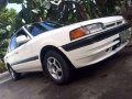 Mazda 323 Familia 97 model MT-0