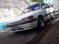 Mazda 323 Familia 97 model MT-3