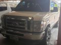 2010 Ford E150 All power 3 rows captain seats-0