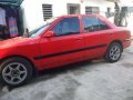 Mazda 323 sedan Good running condition-0