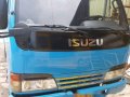 2002 Isuzu Elf Recon 4x2 Mini dump 4HF1 High Deck, High side-1