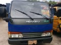 1997 Isuzu Elf Mini Dump 4x2 High Deck, High Side Blue-1