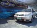 Toyota Corolla Altis 2001 Gasoline Automatic Beige-5