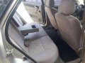 For Sale: Chevrolet Optra gold Makisig 2003-5