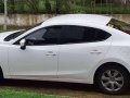 2016 Mazda 3 1.6L A/T. Arctic White color.-1