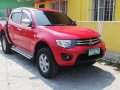 Mitsubishi Strada 2010 manual for sale-0