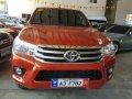 Selling Orange Toyota Hilux 2018 at 12000 km in Pasig-0