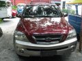 Red Kia Sorento 2005 at 122200 km for sale-0