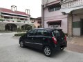 Black 2015 Toyota Wigo at 54000 km for sale -0