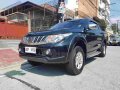 Selling Black Mitsubishi Strada 2016 Manual Diesel at 35000 km in Quezon City-1