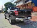Selling Black Mitsubishi Strada 2016 Manual Diesel at 35000 km in Quezon City-4