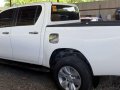 Selling White Toyota Hilux 2016 at 8800 km in Quezon City-1