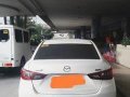 Selling White Mazda 2 2016 for sale in Quezon City-1