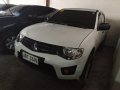 Selling White Mitsubishi Strada 2014 for sale in Pasig-2