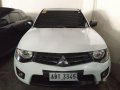 Selling White Mitsubishi Strada 2014 for sale in Pasig-0