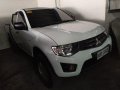 Selling White Mitsubishi Strada 2014 for sale in Pasig-1