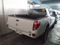 Selling White Mitsubishi Strada 2014 for sale in Pasig-4