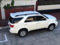 Selling White Toyota Fortuner 2006 Automatic Gasoline in Marikina-0