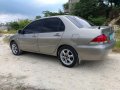 Selling 2004 Mitsubishi Lancer for sale in Consolacion-1