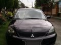 Selling Mitsubishi Lancer 2009 in Lumban-1