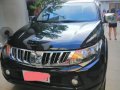 Selling Mitsubishi Strada 2015 Manual Diesel in Consolacion-0