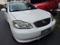 White Toyota Corolla Altis 2004 for sale in Quezon City-0