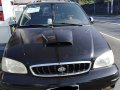 Selling Black Kia Carnival 2001 120000 km in Lipa-0