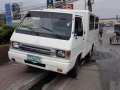 Selling White Mitsubishi L300 2012 at 70000 km in Quezon City-3