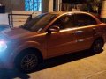 Selling Orange Kia Rio 2011 Automatic Gasoline in Quezon City-0