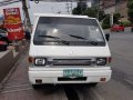 Selling White Mitsubishi L300 2012 at 70000 km in Quezon City-4