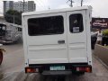 Selling White Mitsubishi L300 2012 at 70000 km in Quezon City-1