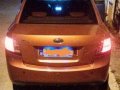 Selling Orange Kia Rio 2011 Automatic Gasoline in Quezon City-9